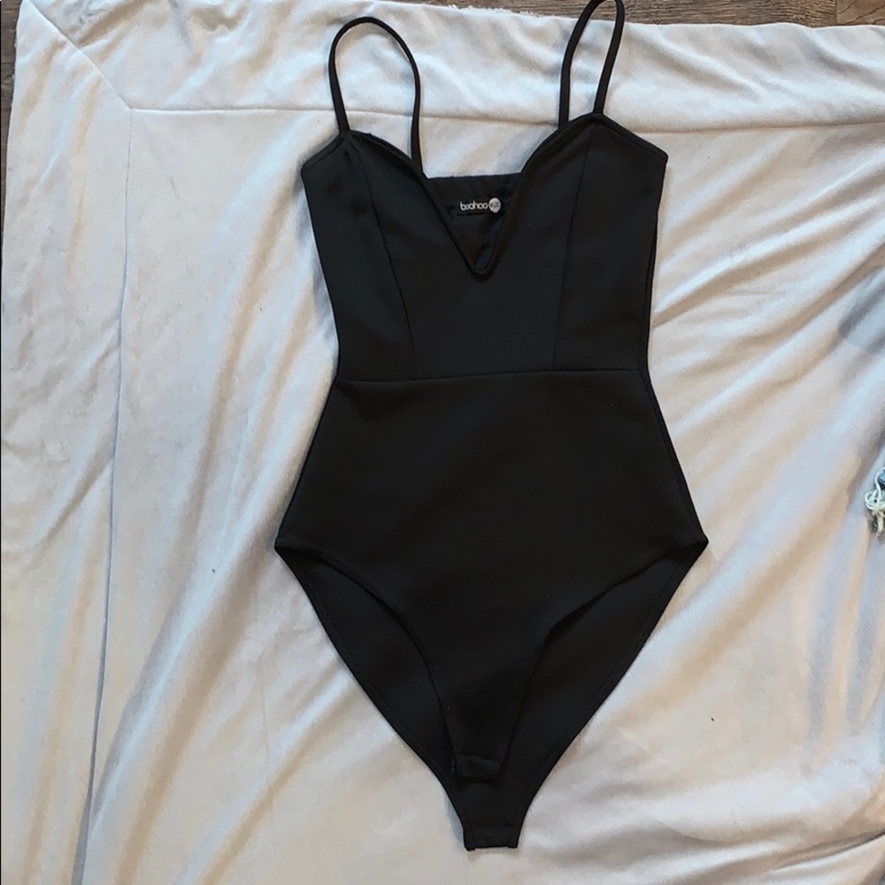 V cut body suit NEVER WORN